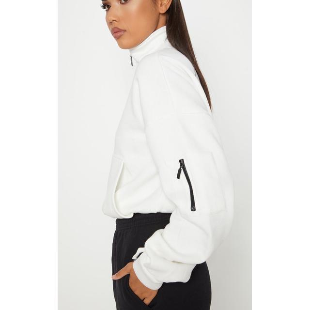 cream zip front sweater