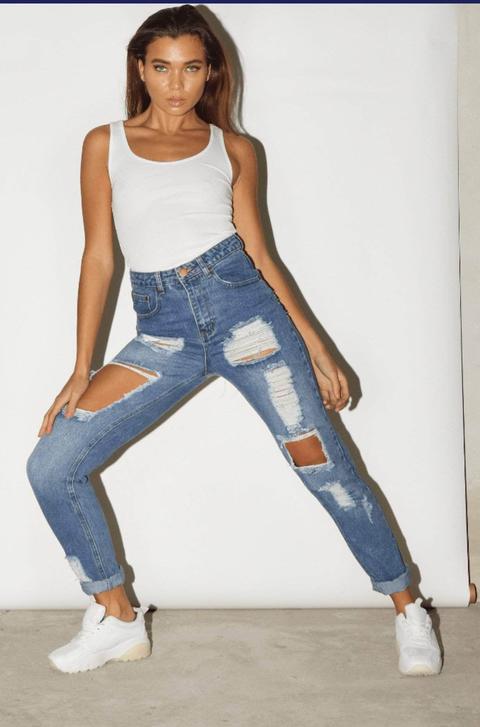 Long Heavily Distressed Light Wash Denim Jeans