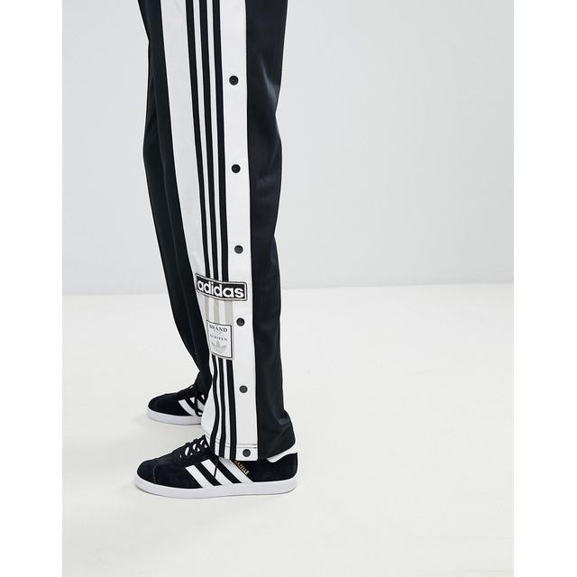 pantaloni adidas bottoni