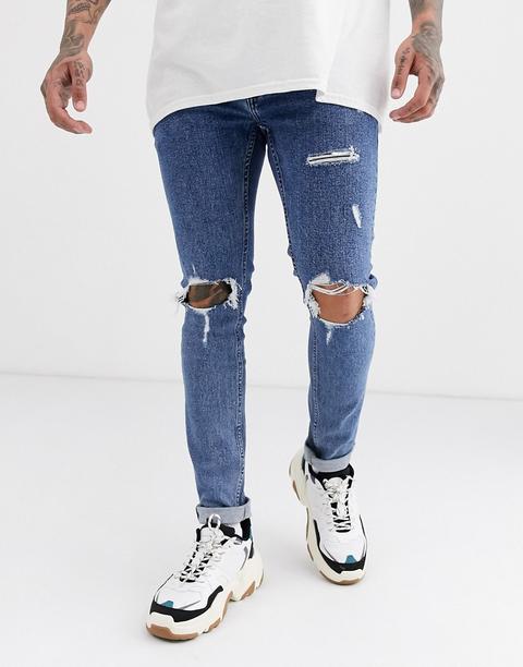 Vaqueros Ajustados En Azul Desgastado Con Rotos De Topman