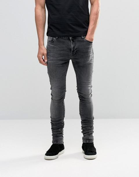 Asos - Stacker - Jeans Skinny E Lunghi Neri Lavaggio Marmorizzato - Nero  from ASOS on 21 Buttons