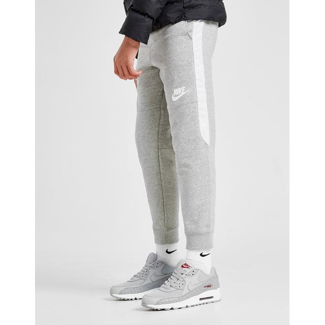 grey and white nike joggers