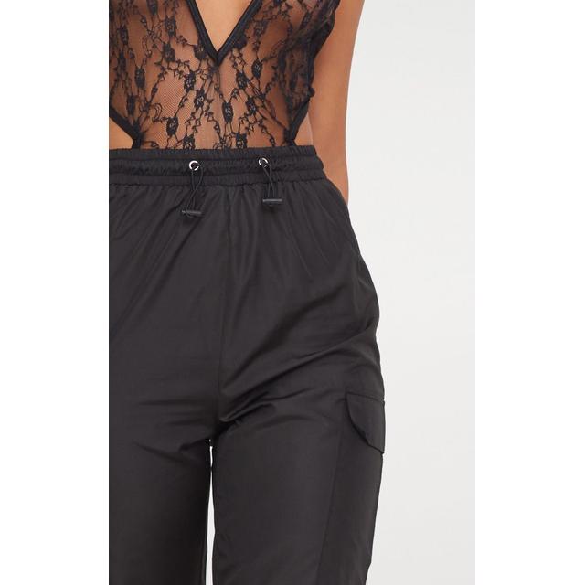 black toggle waist shell suit joggers