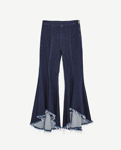 Pantaloni Denim Flare Asimmetrici