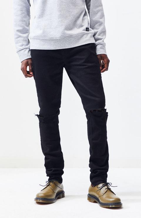 stacked skinny black jeans