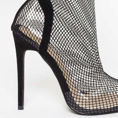 clear fishnet heels