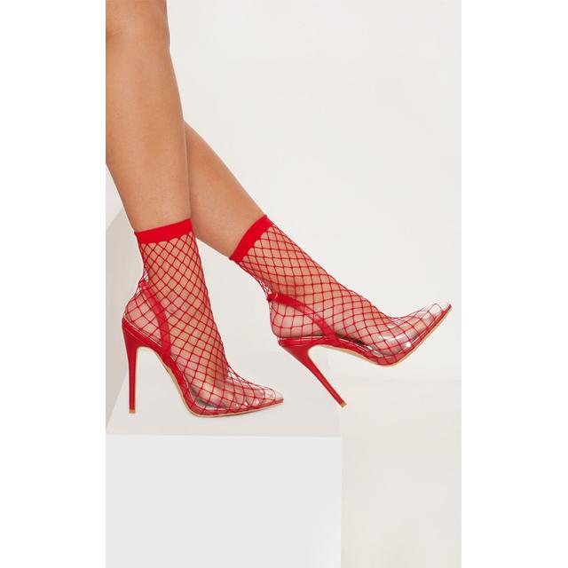 black fishnet heels