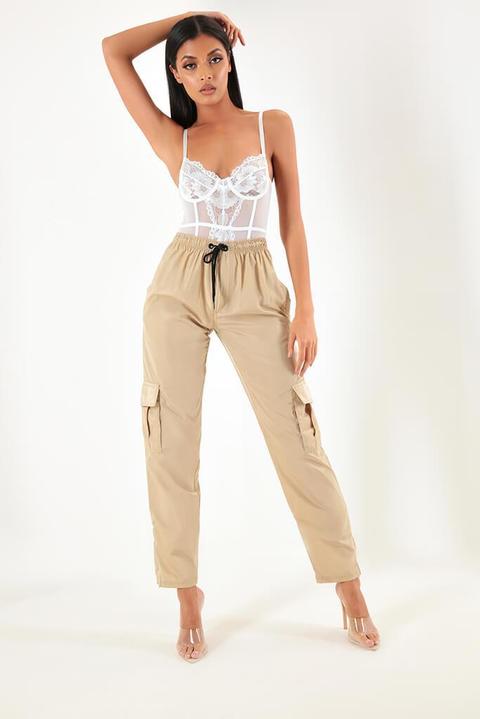 lace bodysuit and cargo pants
