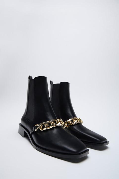 flat ankle boots with chain