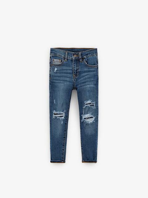 Jeans Skinny Strappati