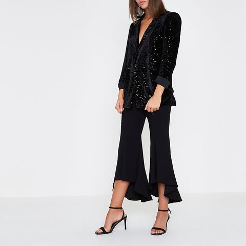 black cropped flared trousers