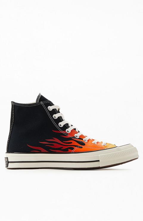 black converse with flames