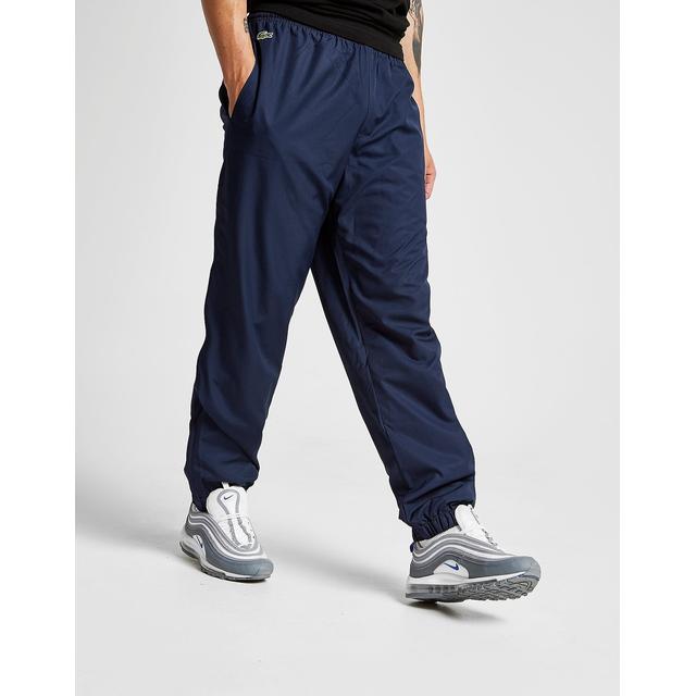 lacoste tape guppy track pants