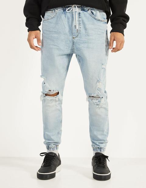 Jeans Jogger Con Rotos