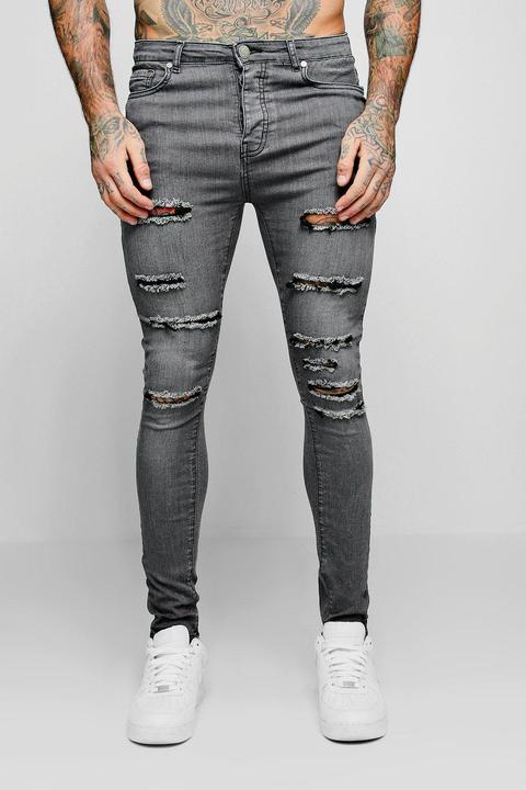 Spray On Skinny Jeans With All Over Rips