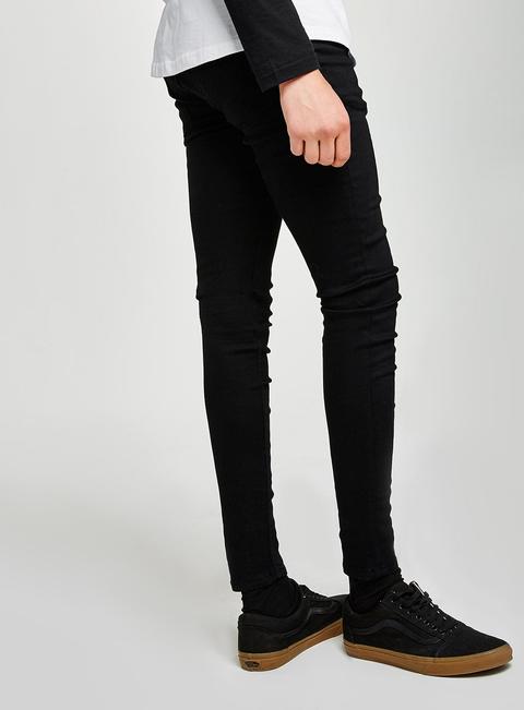 black spray on skinny jeans