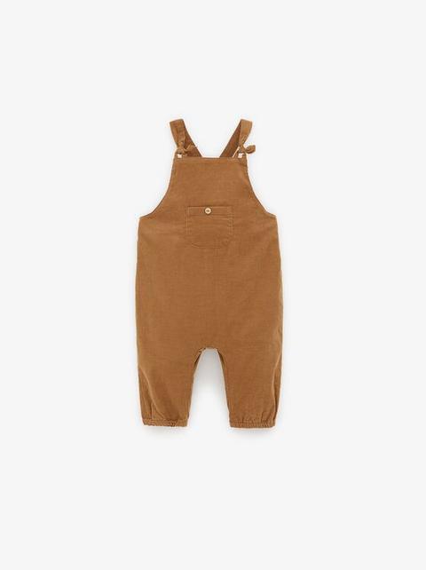 beige corduroy overalls
