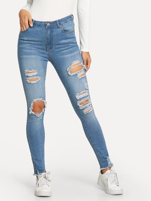 Jeans Strappati Con Orlo Grezzo