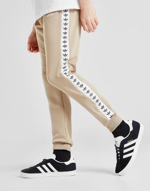 Caramelo Persistente Reproducir Adidas Originals Tape Poly Track Pants Junior - Beige - Kids from Jd Sports  on 21 Buttons
