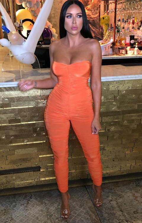 orange strapless jumpsuit