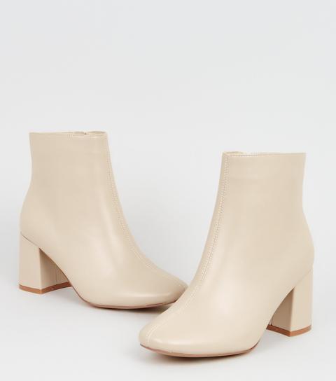 Wide Fit Cream Flared Heel Ankle Boots New Look from NEW LOOK on 21 Buttons