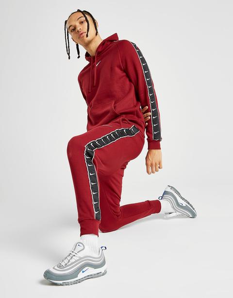 nike track pants red