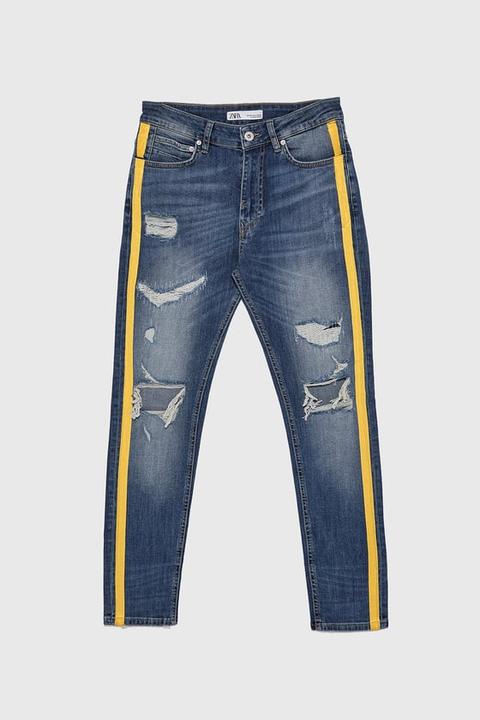blue jeans with yellow stripe