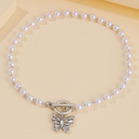 Butterfly Charm Faux Pearl Choker