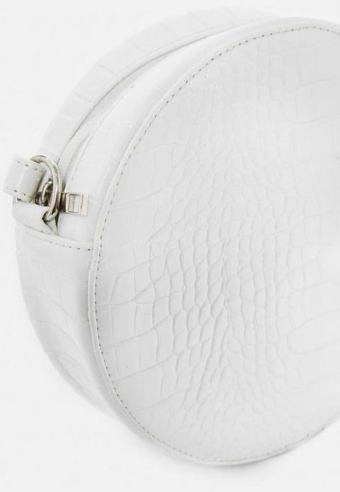 white round crossbody bag