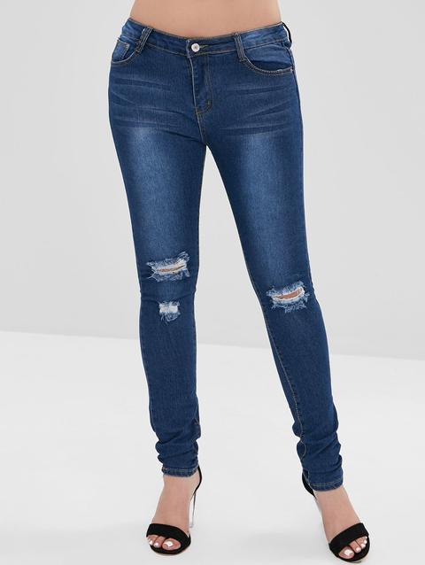 Jeans Aderenti Strappati