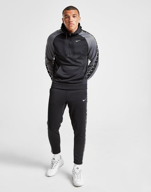 taped nike tracksuit