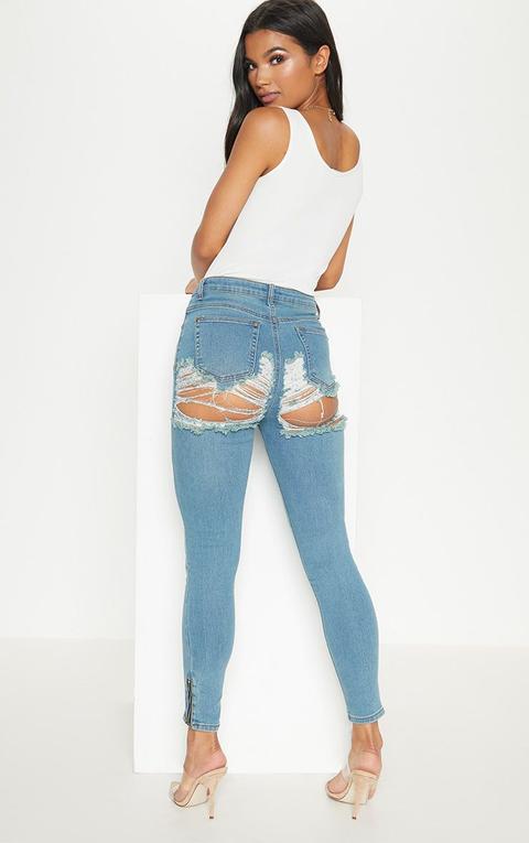 Light Wash Distressed Bum Rip High Waisted Skinny Jean