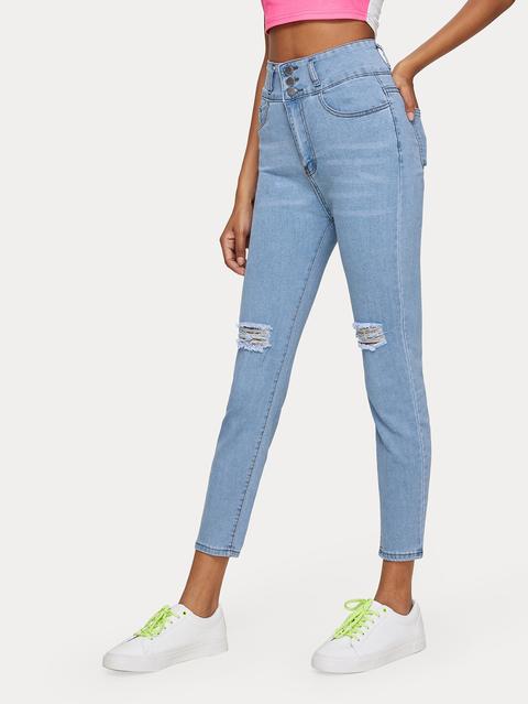 Jeans Skinny Con Strappati E Bottone