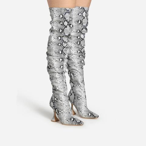 thigh high snake print boots