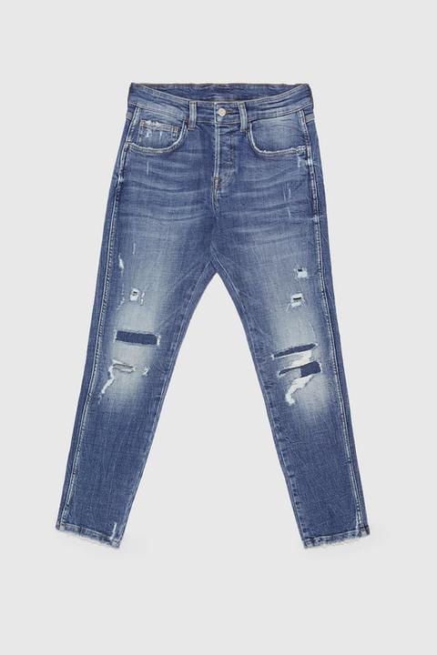 Jeans Con Strappi Raw Edge