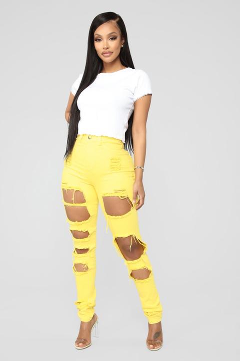 yellow distressed jeans