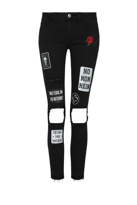 Jeans Skinny Neri Destroyed Con Patch