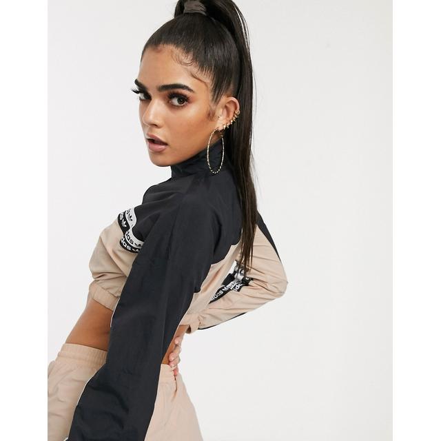 adidas originals ryv taping cropped jacket in blush