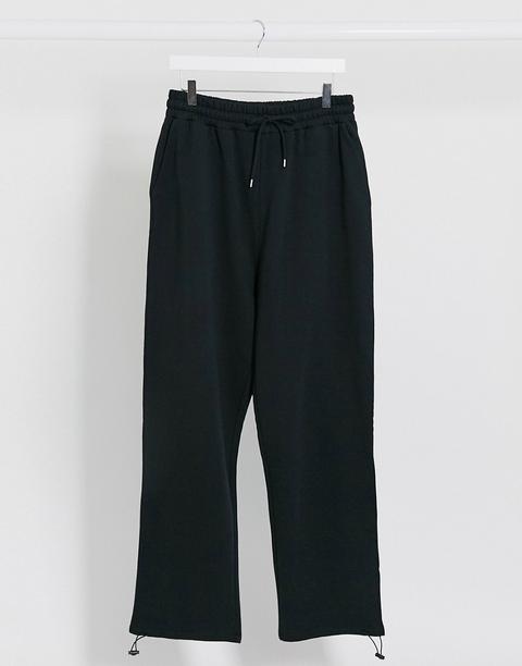 Asos Design Super Oversized Joggers In Black With Toggle Hem