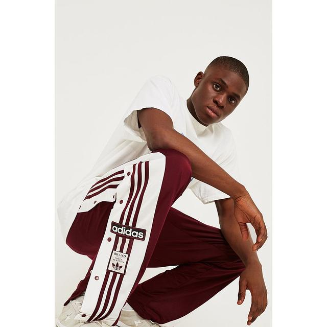 Adidas Adibreak Maroon Track Pants from Urban Outfitters on 21 Buttons