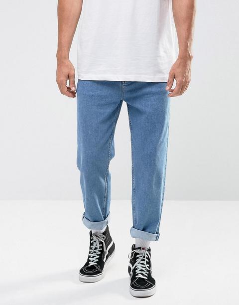 Asos Design Skater Jeans In Mid Wash Blue