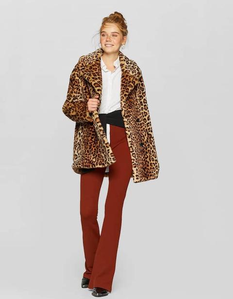 Pantaloni A Campana In Maglia A Tinta Unita Mattone from Stradivarius on 21  Buttons