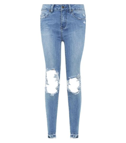blue ripped knee skinny jeans