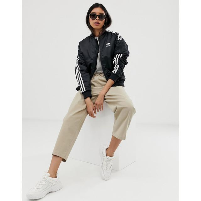 adidas originals locked up logo track jacket in black