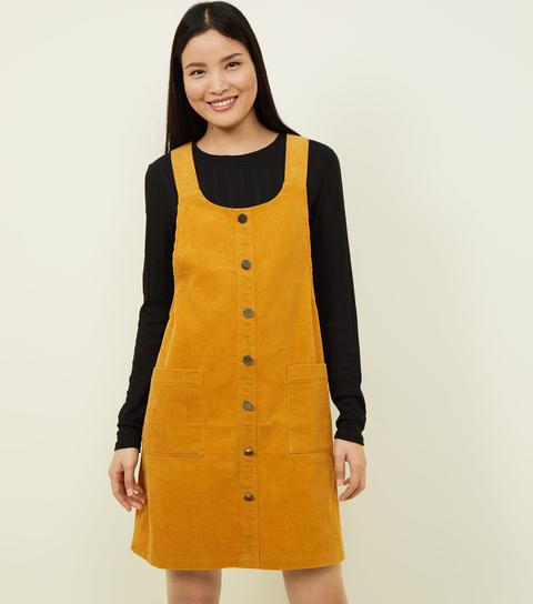 mustard cord pinafore dress