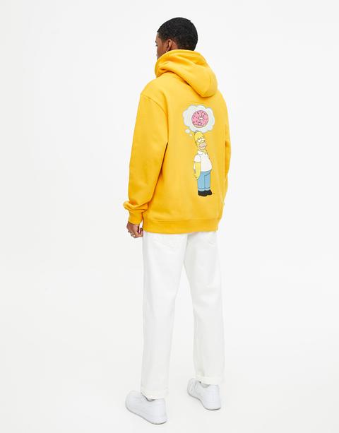 Sudadera Los Simpson Amarilla Donut from Pull and Bear on 21 Buttons