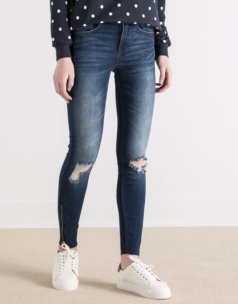 Jeans Skinny Cremalleras Bajo Roto