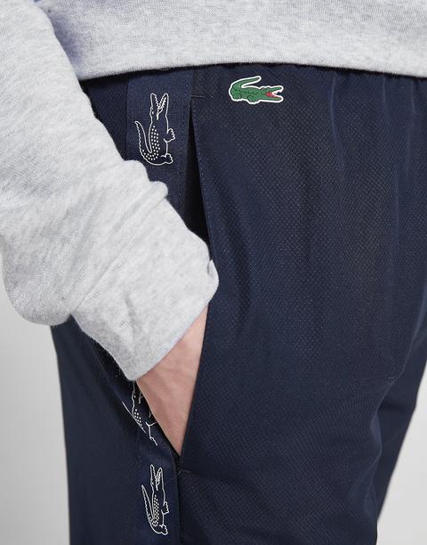 lacoste tape woven track pants