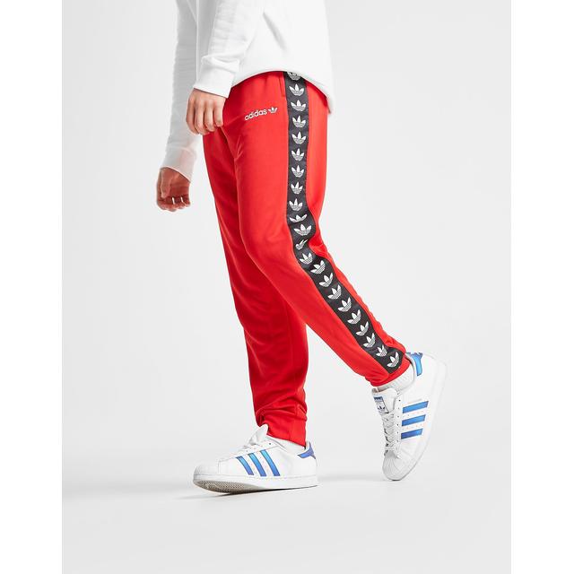 red adidas pants button down side