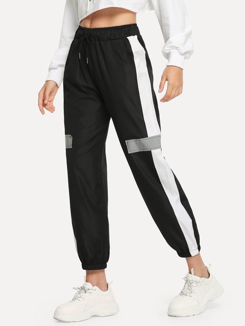 Pantaloni A Vento Con Coulisse Sul Lato E Fascia A Contrasto